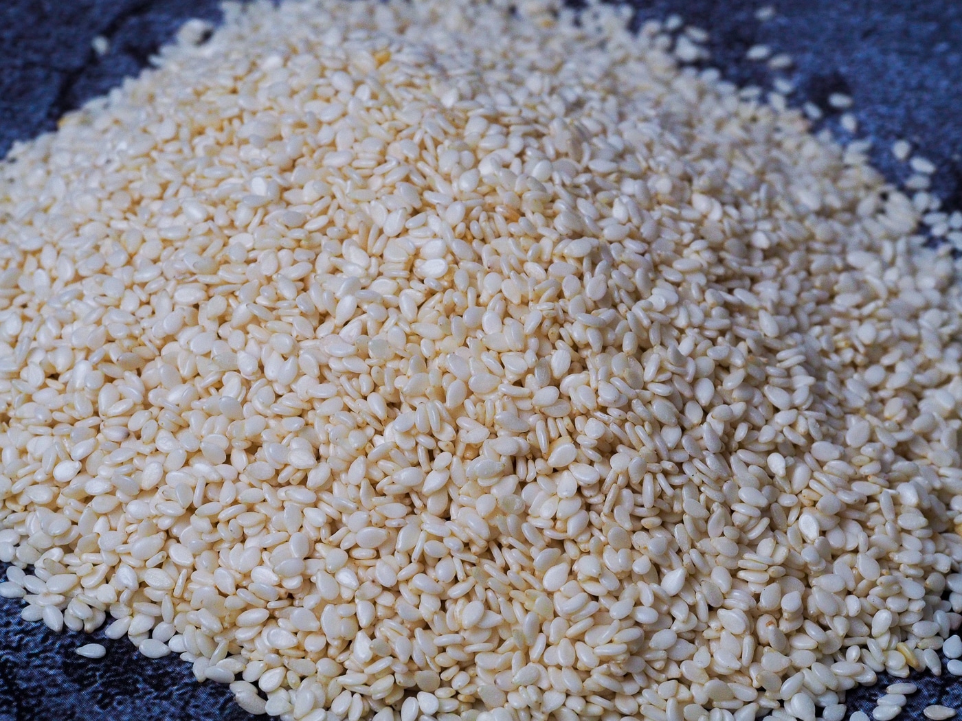 A pile of raw white sesame seeds